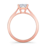 Princess cut lab grown diamond solitaire ring with rose gold prongs, showcasing a timeless and elegant design.