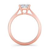 Princess cut lab grown diamond solitaire ring with rose gold prongs, showcasing a timeless and elegant design.