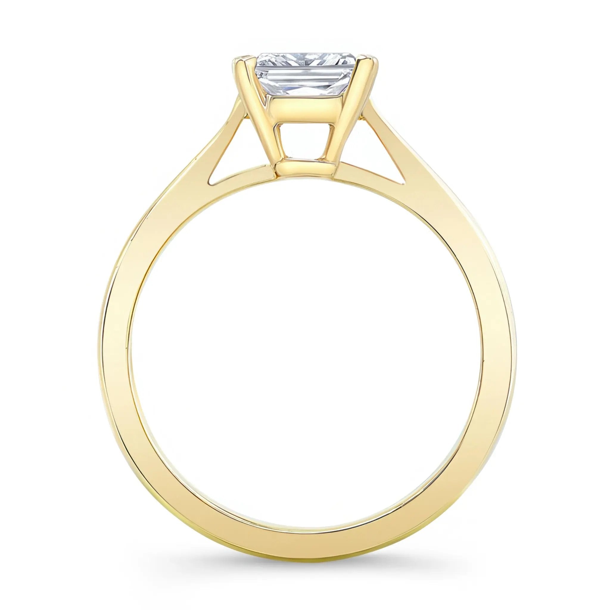 Princess cut lab grown diamond solitaire ring with yellow gold band and prong setting, elegant design.
