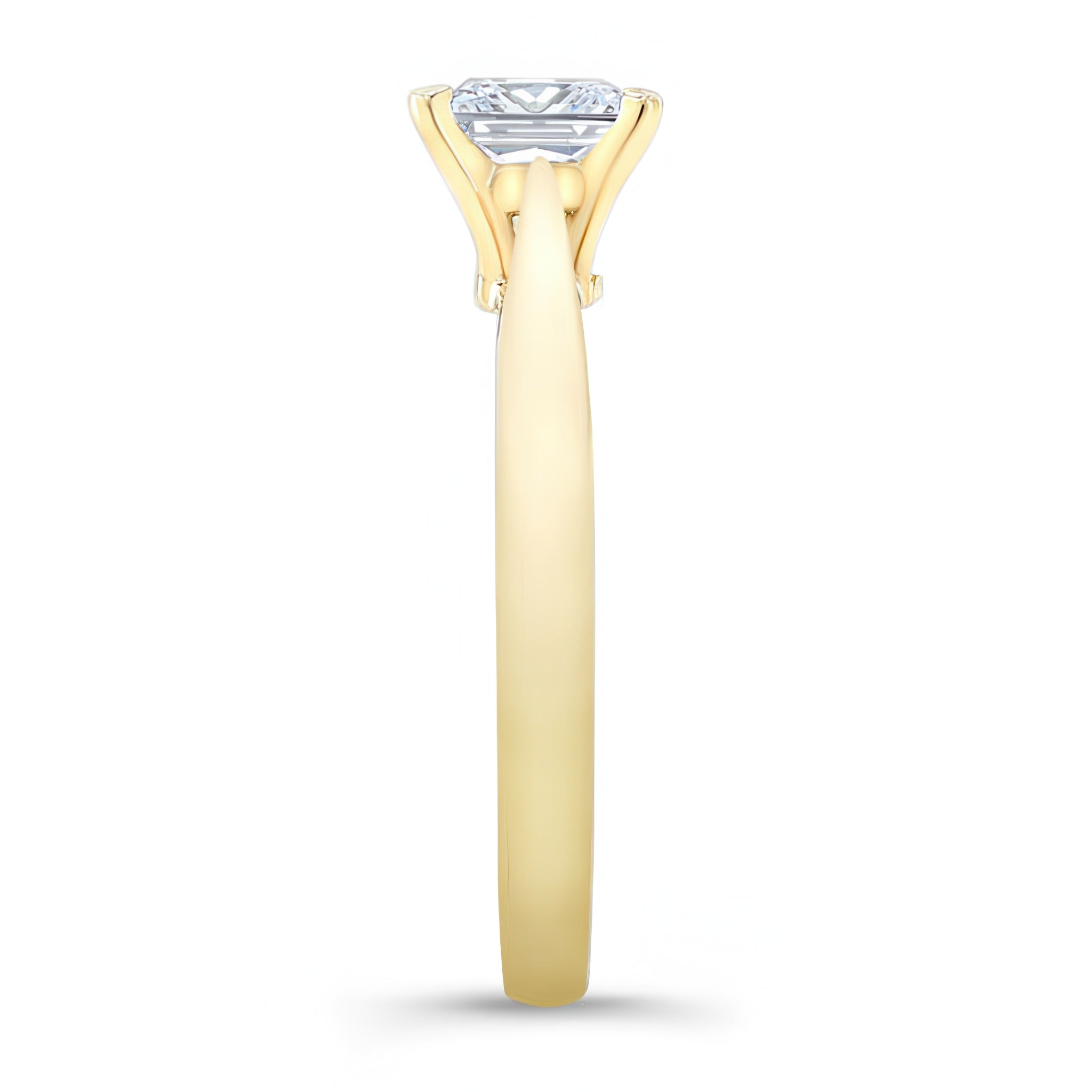 Princess cut lab grown diamond solitaire ring in yellow gold, showcasing elegant prong design and classic style.