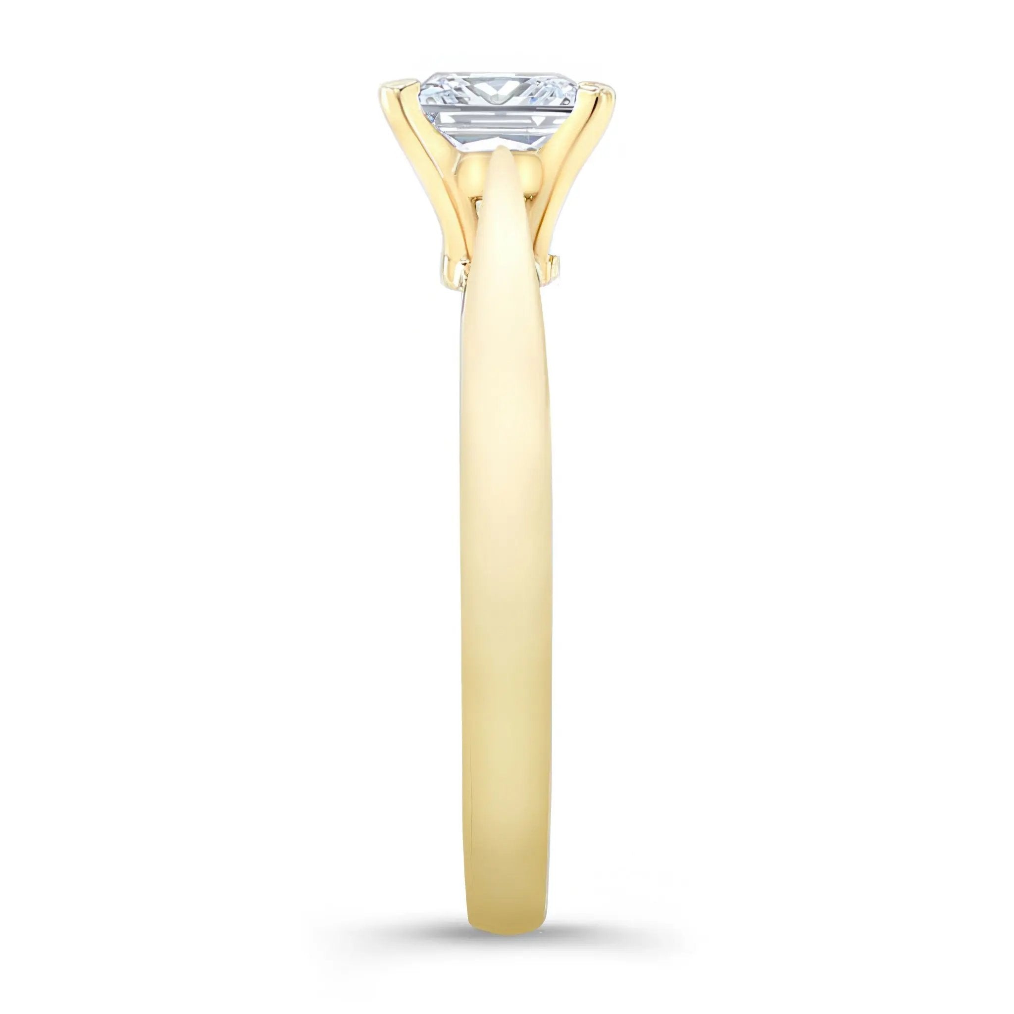 Princess cut lab grown diamond solitaire ring in yellow gold, showcasing elegant prong design and classic style.