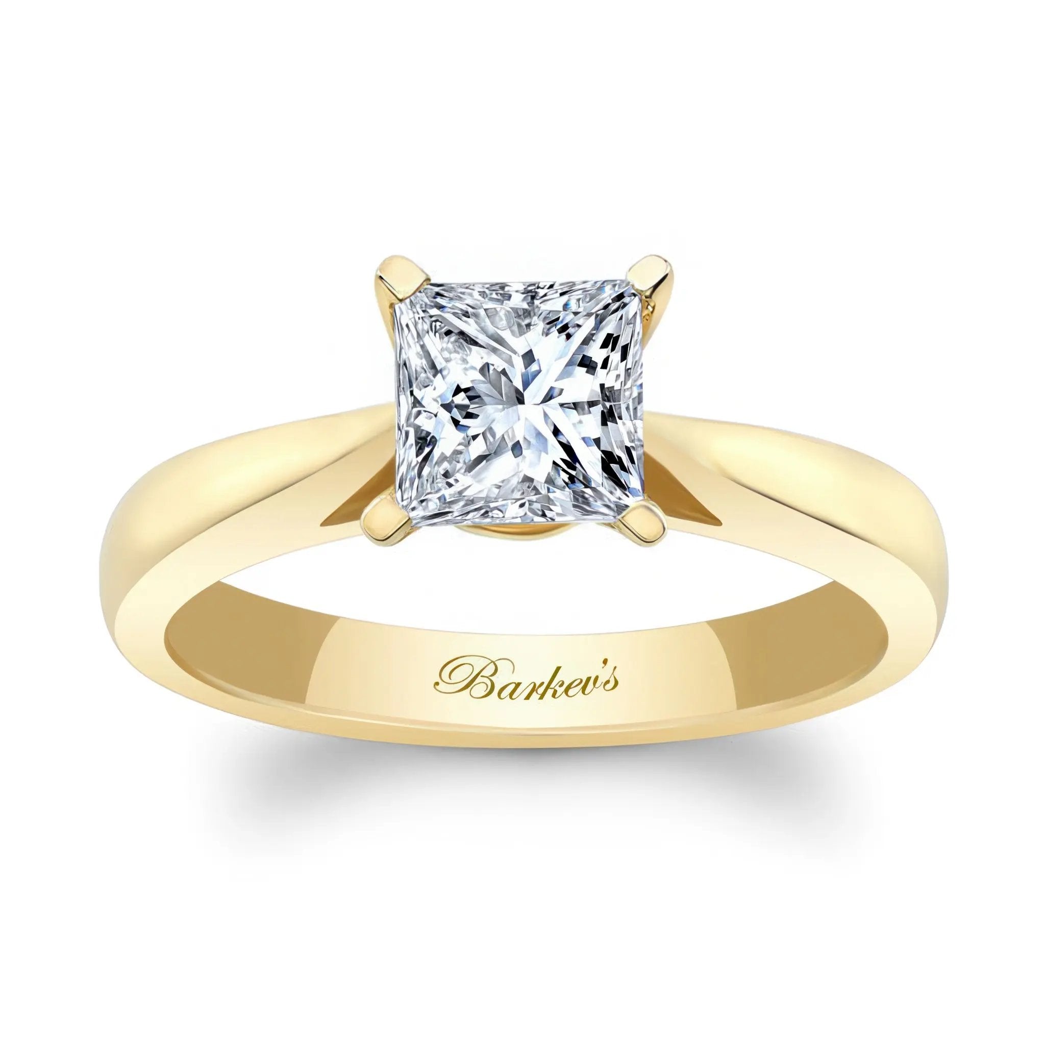 Princess cut lab grown diamond solitaire ring in yellow gold setting, elegant and timeless design.