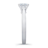 Princess cut lab grown diamond solitaire ring showcasing elegant prongs and sleek band design.