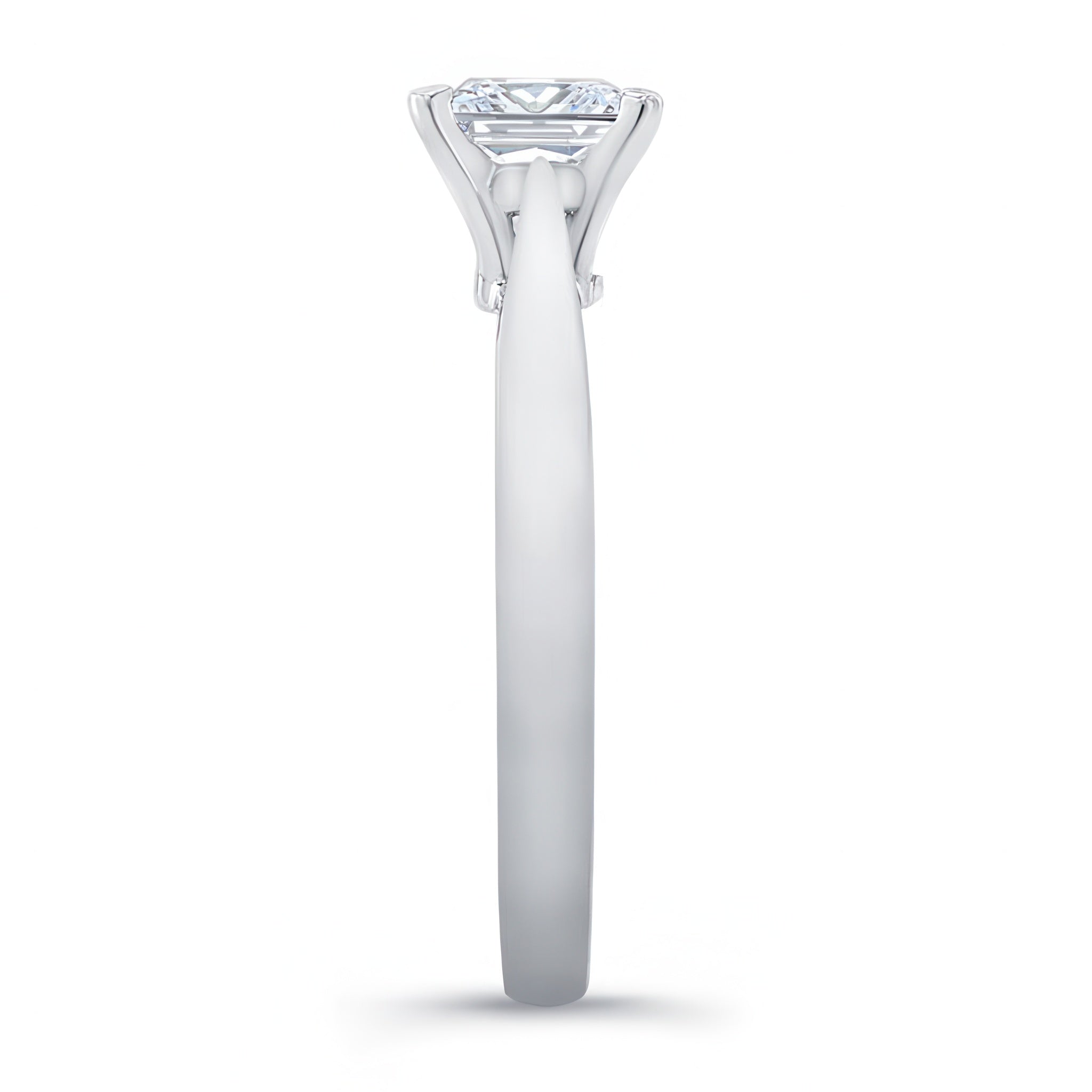 Princess cut lab grown diamond solitaire ring showcasing elegant prongs and sleek band design.