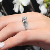 Looping Solitaire Moissanite Ring