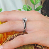 Simple Curving Moissanite Solitaire Ring