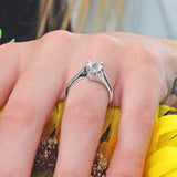 Simple Curving Moissanite Solitaire Ring