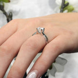 Four Prong Split Shank Moissanite Solitaire Ring