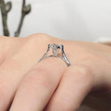 Unique Flared Moissanite Engagement Ring