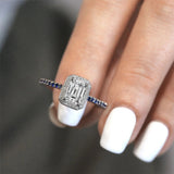 1 Carat Emerald Cut Lab Diamond Halo Engagement Ring With Blue Sapphires
