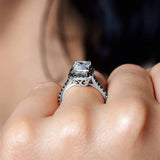 Emerald Cut Moissanite Halo Ring With Black Diamonds