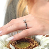 Twisted Moissanite Engagement Ring With Black Diamonds