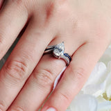 Blue Sapphire Accent Pear Shaped Ring