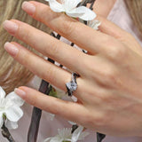Black Diamond Accent Teardrop Moissanite Ring