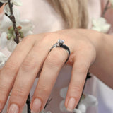 Black Diamond Accent Teardrop Moissanite Ring