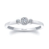 Sophia Three Stone Promise Ring in white gold with bezel set diamonds, symbolizing love and commitment.