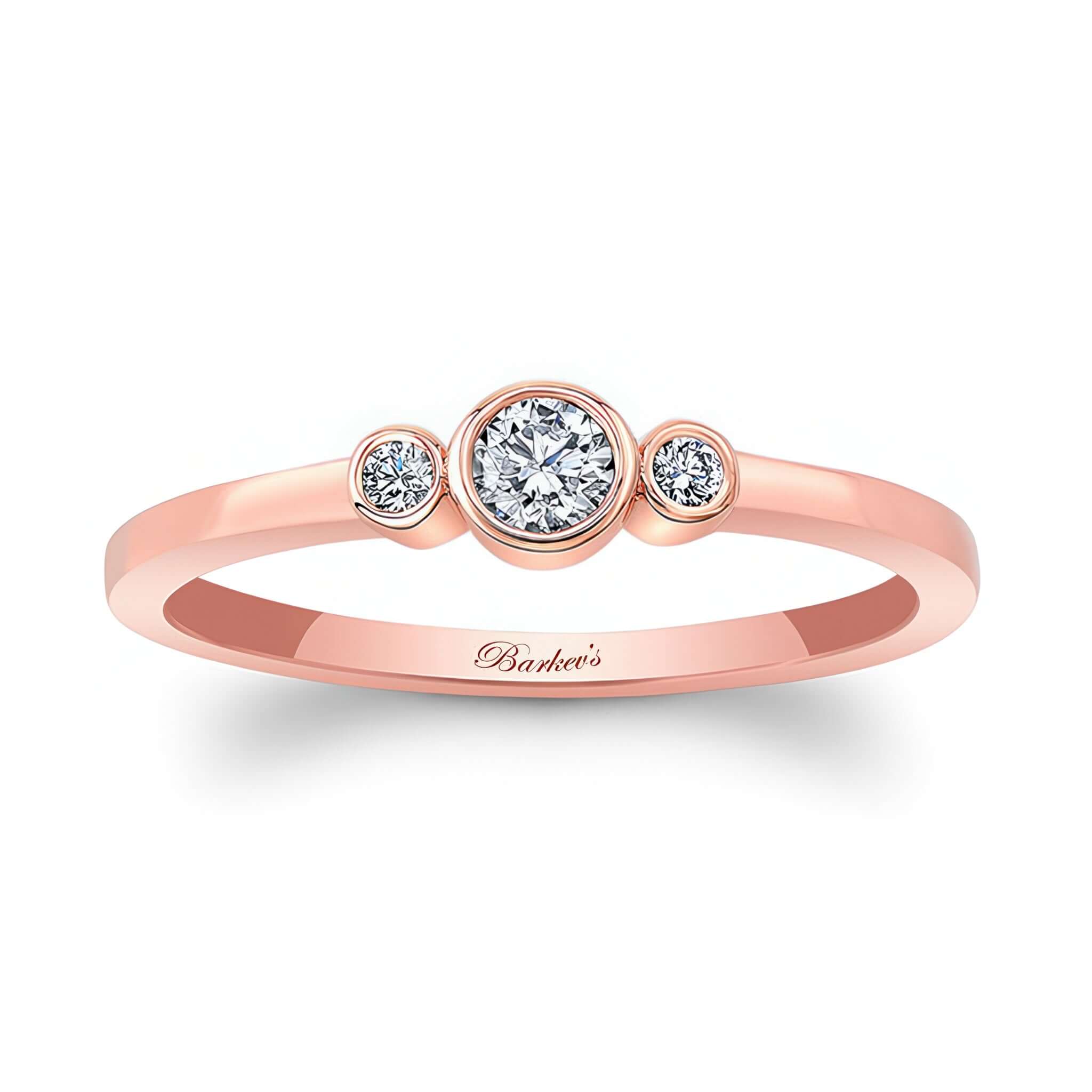 Sophia Three Stone Promise Ring in rose gold featuring a bezel set diamond center and two accent diamonds.