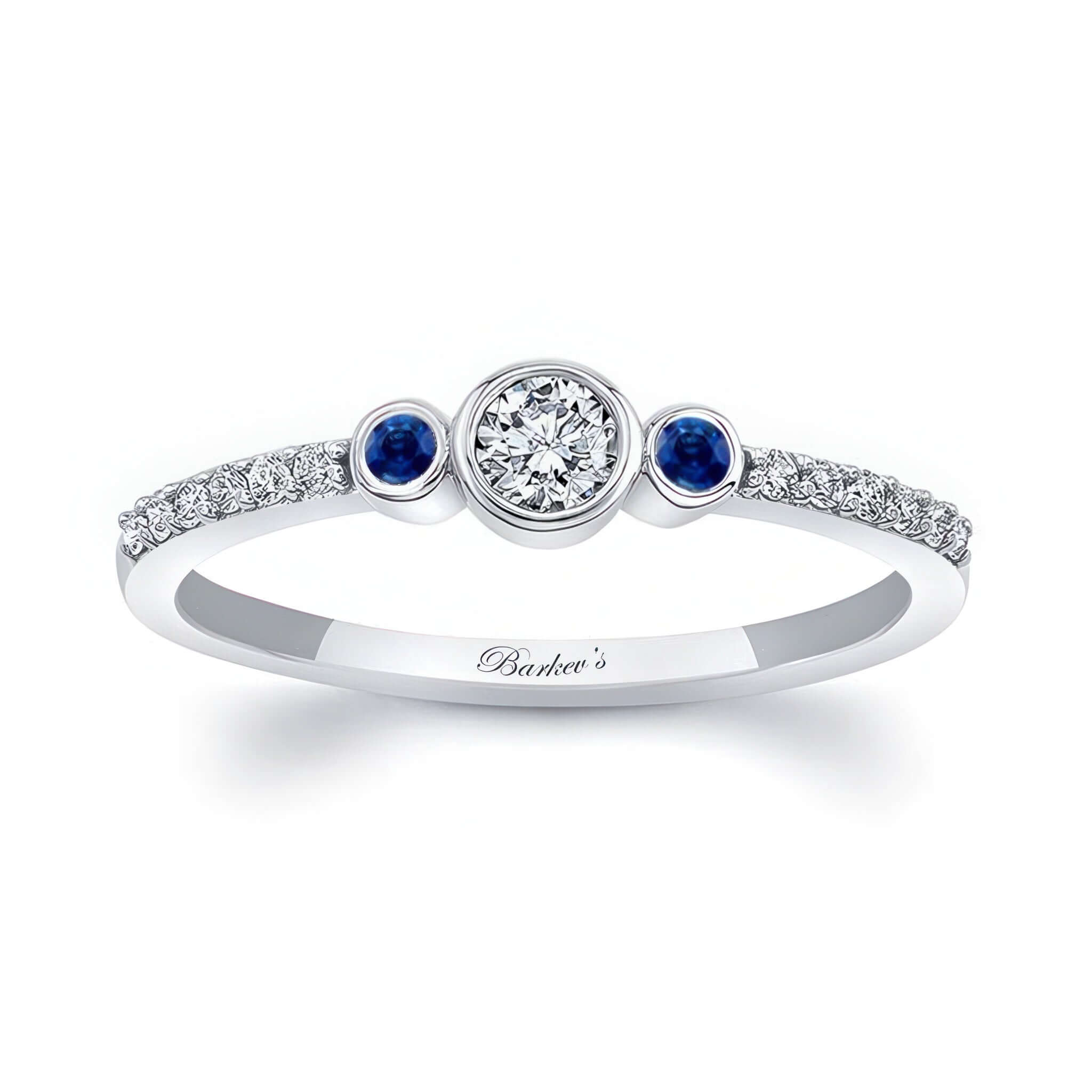 Mia three stone blue sapphire accent diamond promise ring with center diamond and sapphire side stones.
