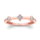 Mila Three Stone Princess Cut Promise Ring featuring a rose gold band and three bezel set diamonds for a unique elegance.