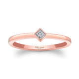 Aria princess cut diamond promise ring in rose gold with bezel set diamond center, perfect for timeless elegance.