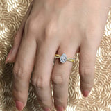 Pear Shaped Engagement Ring With Twisted Band