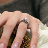 Pear Shaped Moissanite Black Diamond Accent Twist Bridal Set