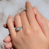 Emerald Cut Blue Diamond Accent Moissanite Ring