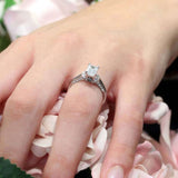 Emerald Cut Blue Diamond Accent Moissanite Ring