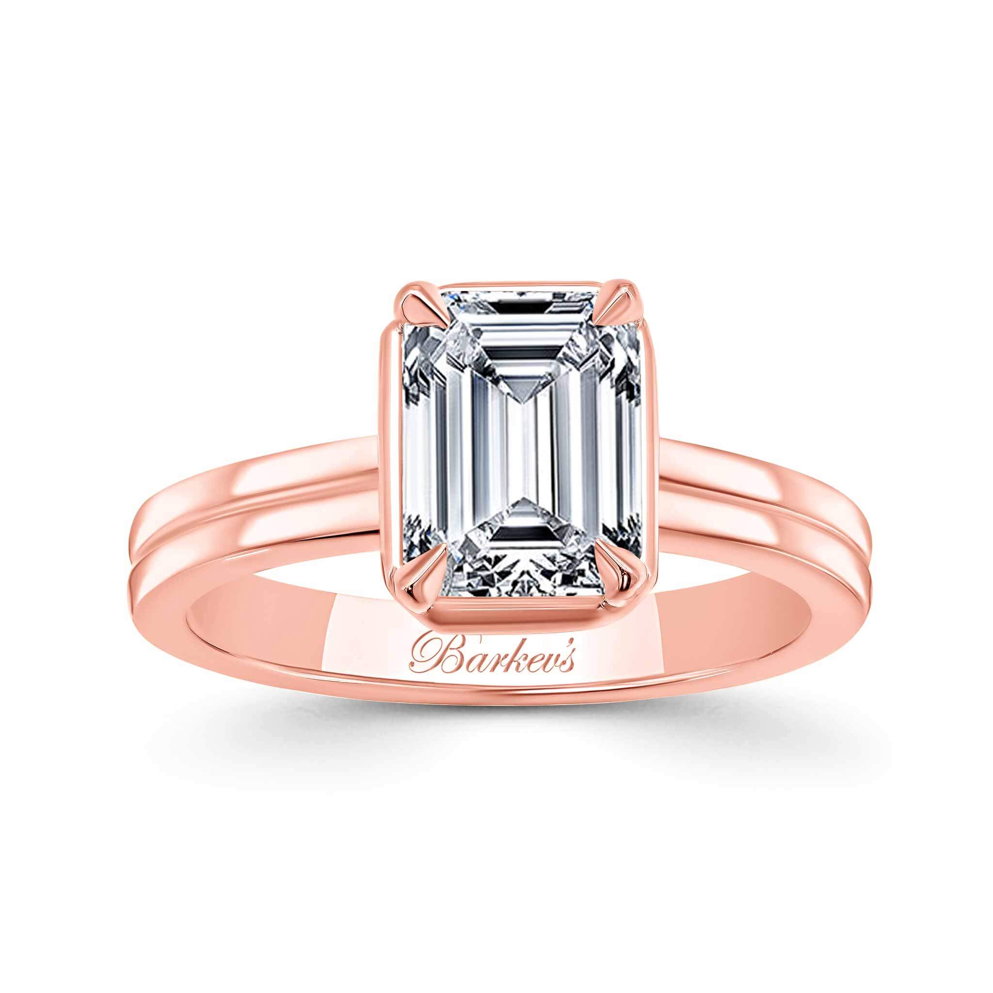 Double Band 2 Carat Emerald Cut Diamond Solitaire Ring in rose gold showcasing brilliance and elegant design.