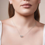 Gold Double Circle Necklace worn by model, showcasing elegant intertwined circles in a sophisticated style.