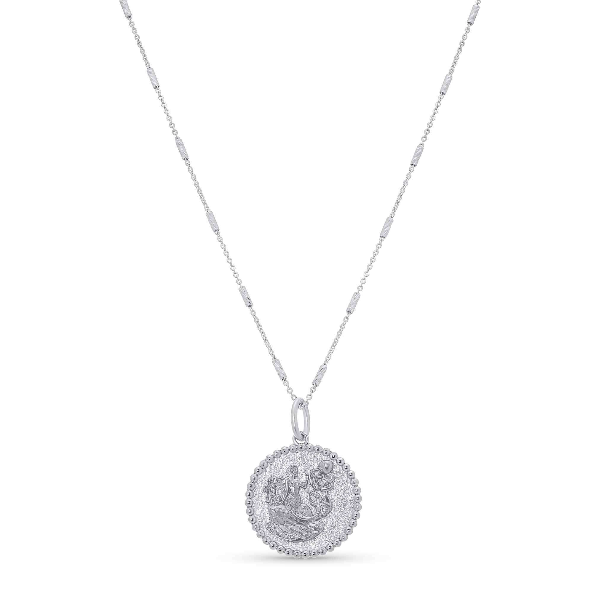 Zodiac Necklace featuring a medallion design with textured background and round borders on a sleek bar chain.