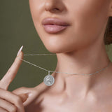 Zodiac Necklace featuring a medallion hanging from a sleek bar chain, perfect for showcasing your star sign.