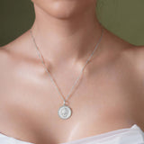 Zodiac Necklace featuring a medallion-style pendant on a sleek chain, celebrating your star sign with elegance.