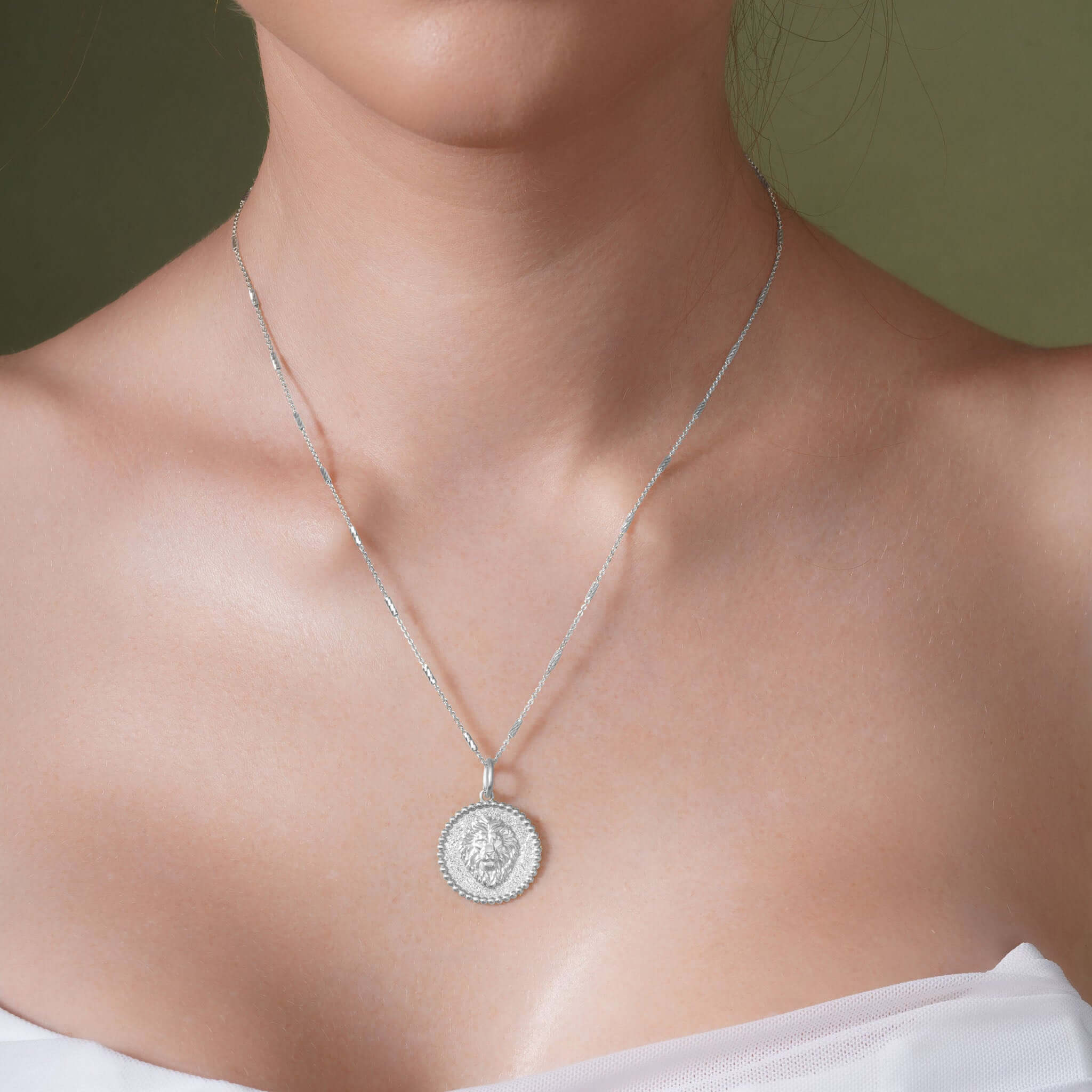 Zodiac Necklace featuring a medallion-style pendant on a sleek chain, celebrating your star sign with elegance.