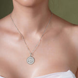 Zodiac Necklace featuring a medallion with the scales symbol, suspended from a sleek silver chain.