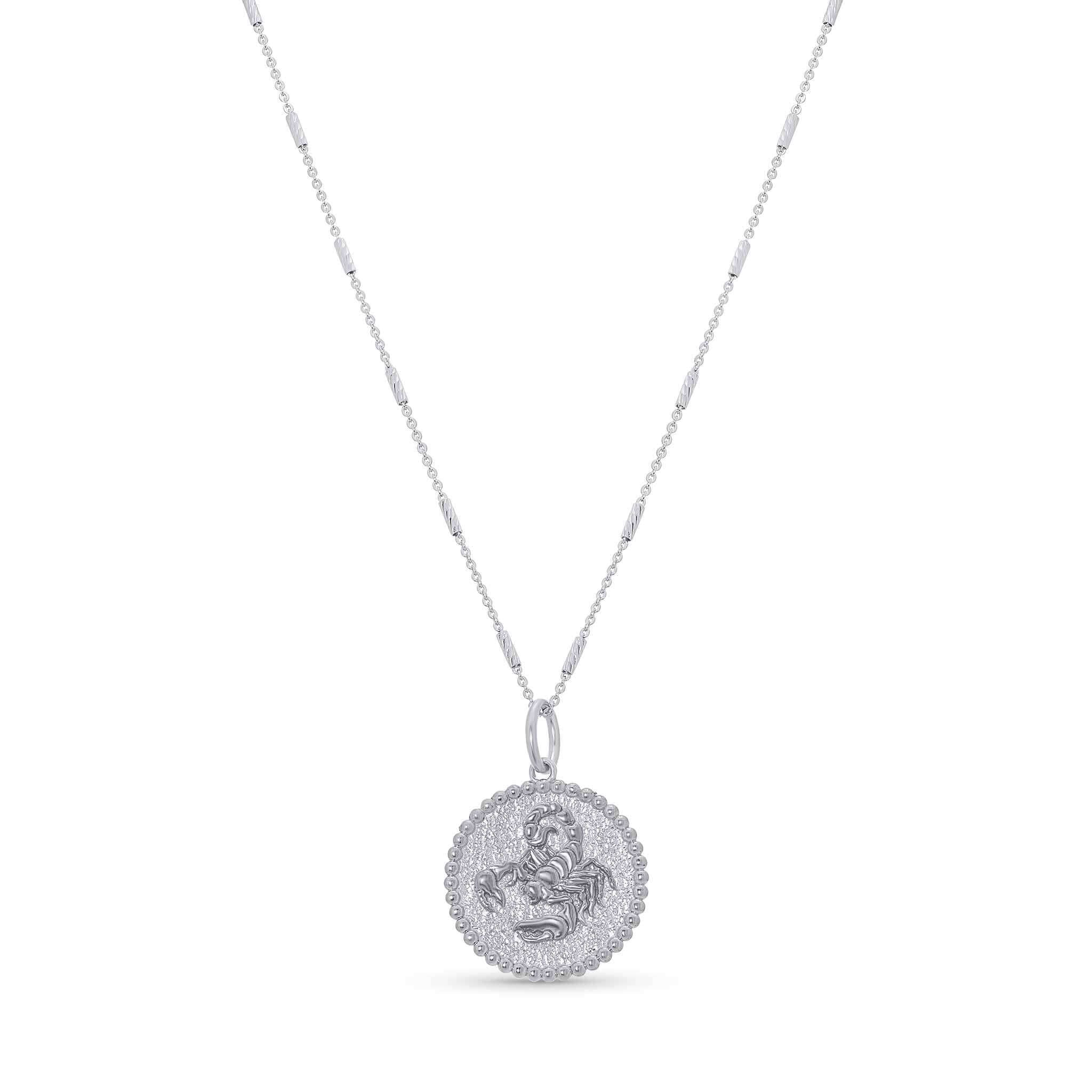 Zodiac Necklace featuring a medallion with zodiac symbol on a sleek bar chain, adjustable from 16 to 18 inches.