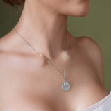 Zodiac Necklace showcasing a zodiac symbol medallion on a sleek bar chain, perfect for layering or everyday wear.