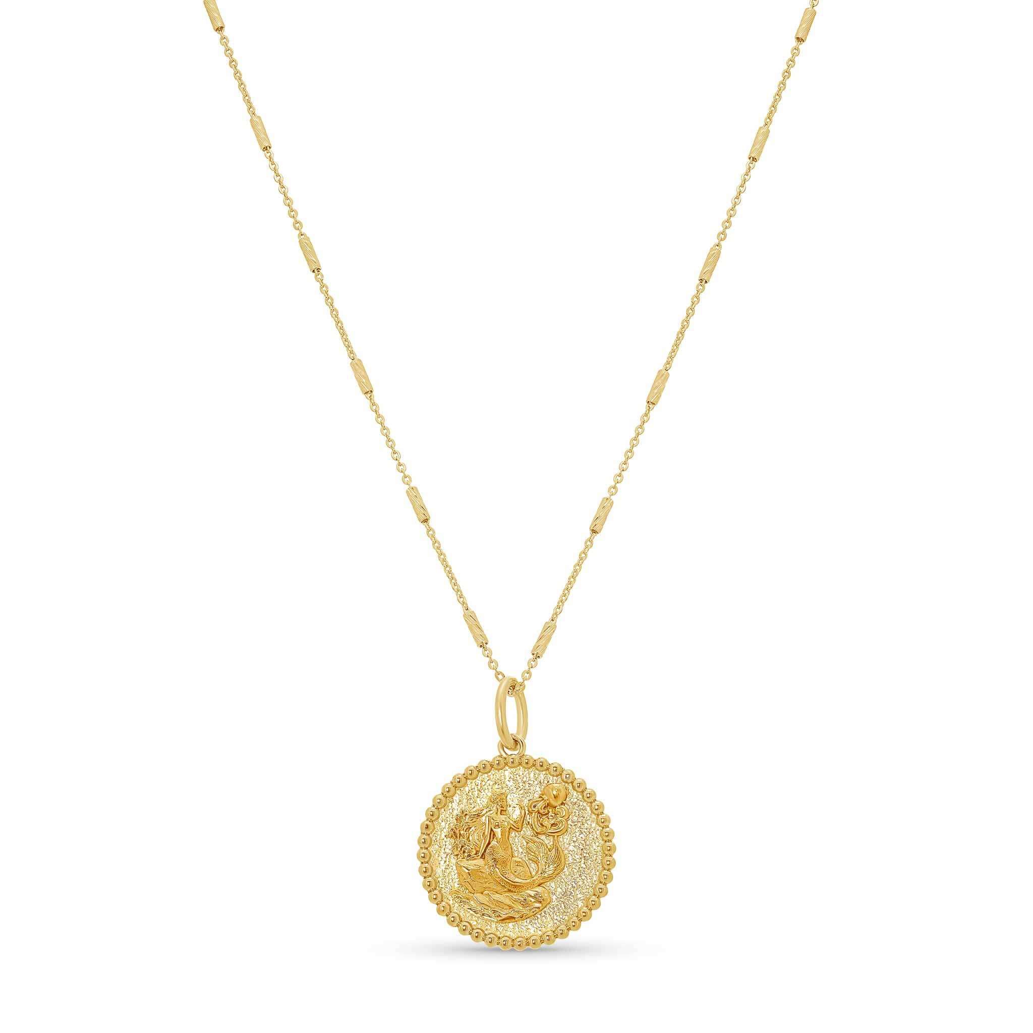 Zodiac Necklace featuring a medallion with zodiac symbol, textured background, and sleek chain.