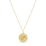 Zodiac Necklace featuring a gold medallion with zodiac symbol on a delicate chain, adjustable length.