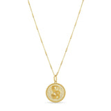 Zodiac Necklace featuring a gold medallion with a zodiac symbol and a delicate bar chain.