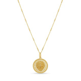 Zodiac Necklace featuring a gold medallion with a lion symbol, framed in delicate round borders on a sleek chain.