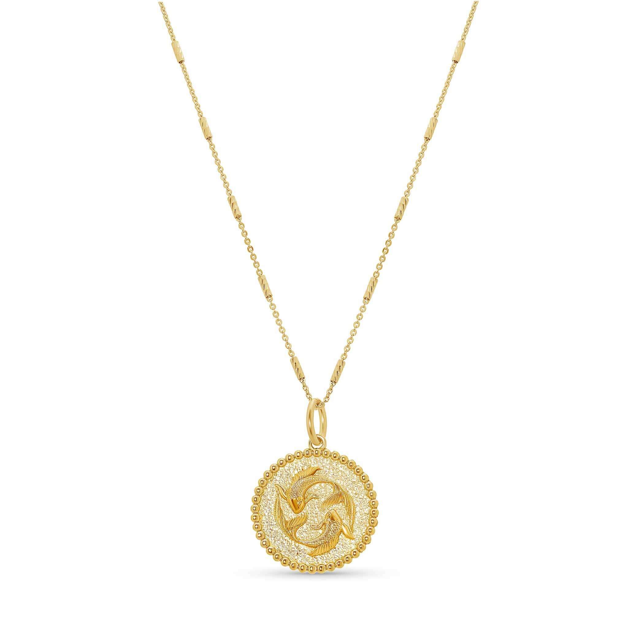 Zodiac Necklace featuring a gold medallion with zodiac symbol on a sleek bar chain, adjustable length 16-18 inches.