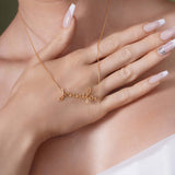 Gold Name Necklace featuring the name 'Jennifer' delicately crafted in 14k solid gold, showcased on a model.