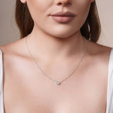 Half Carat Lab Diamond Necklace on a model, showcasing its brilliance and delicate chain design.