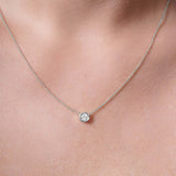 Half Carat Lab Diamond Necklace displayed on a model, featuring a bezel-set lab-grown diamond in a delicate chain.