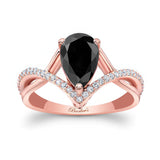 Unique Pear Shaped Black And White Diamond Ring