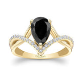 Unique Pear Shaped Black And White Diamond Ring