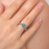 Twisted Blue Diamond Engagement Ring