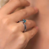 Twisted Blue Diamond Engagement Ring