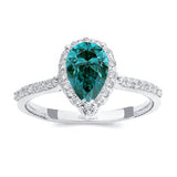 Pear Shaped Blue And White Diamond Halo Ring